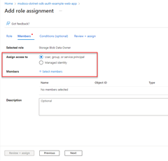 A screenshot showing the radio button to select to assign a role to a Microsoft Entra group and the link used to select the group to assign the role to.