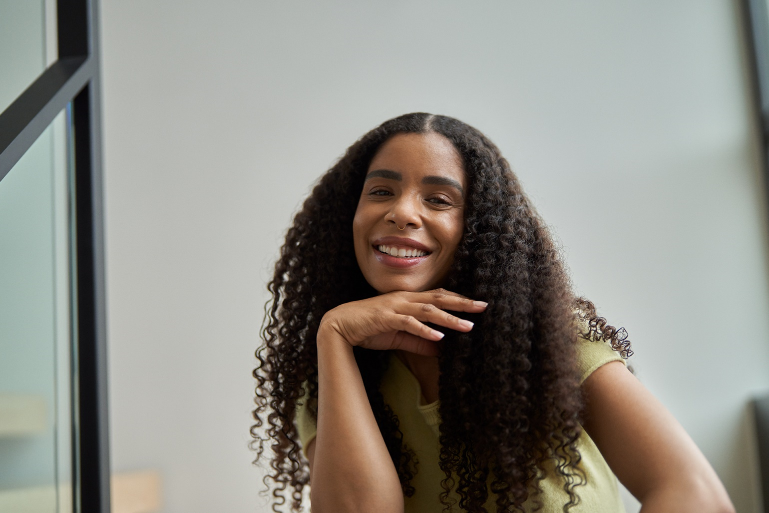 A photograph of a young woman smiling.