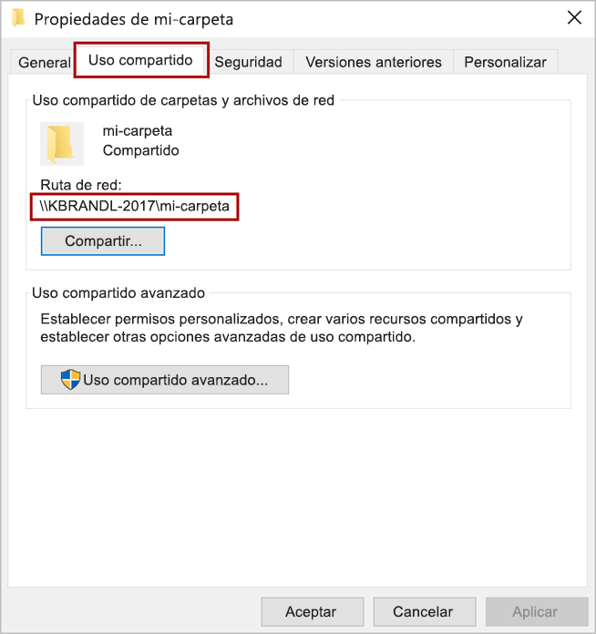 Cuadro de diálogo Propiedades de carpeta con la pestaña Uso compartido y la ruta de acceso de red resaltadas.