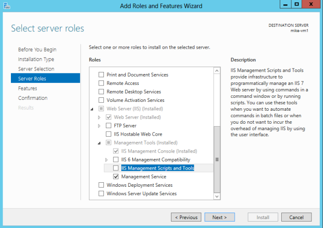 Screenshot dell'Aggiunta guidata ruoli e funzionalità con le opzioni Ruoli del server e I S Management Scripts and Tools evidenziate.