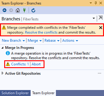 Visual Studio 2019 のチーム エクスプローラーの [ブランチ] ビューのマージ競合メッセージのスクリーンショット。