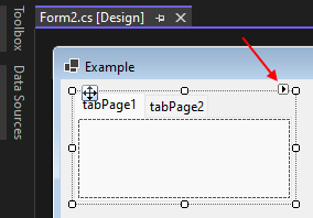 タブ コントロールのスマート タグ ボタンが表示されている Visual Studio の Windows Forms デザイナー。