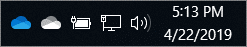 Windows タスク バーの通知領域の OneDrive クラウド アイコン。