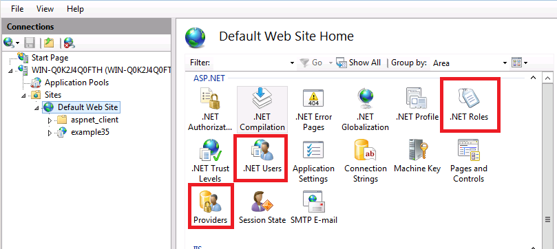 I S Manager U I의 스크린샷 탐색 트리가 왼쪽 창에 있습니다. 기본 웹 사이트가 선택되어 있습니다. dot net Roles, dot net Users 및 Providers 아이콘이 강조 표시됩니다.