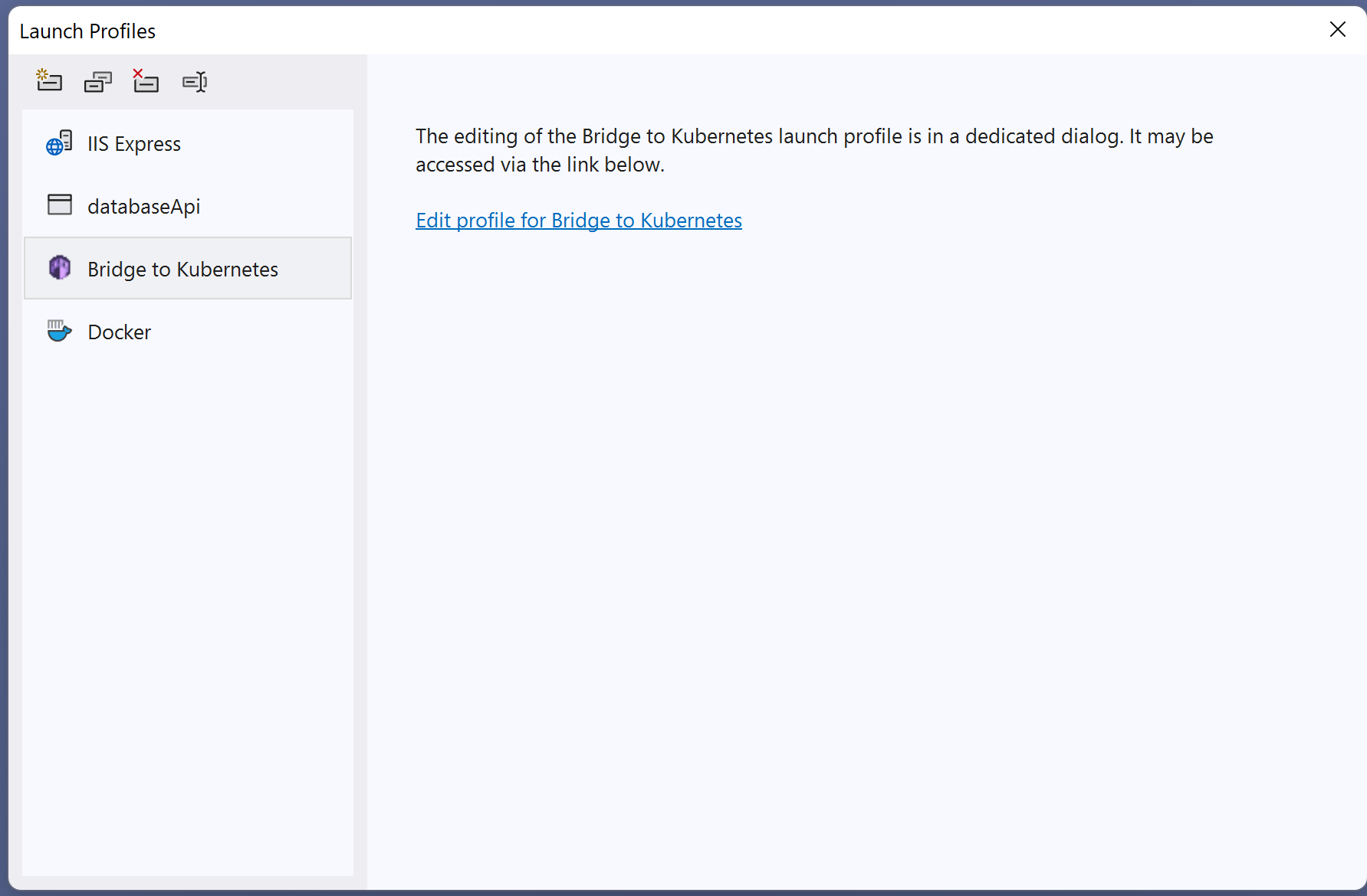 Screenshot shows Launch Profiles dialog with a link to edit the Bridge to Kubernetes profile